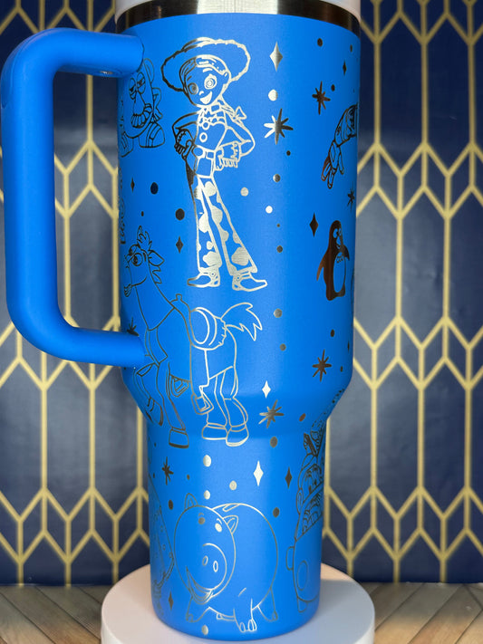 a blue toilet paper dispenser on a wall